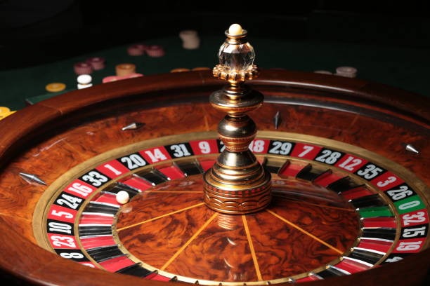 Live baccarat table showing dealer, cards, and betting interface